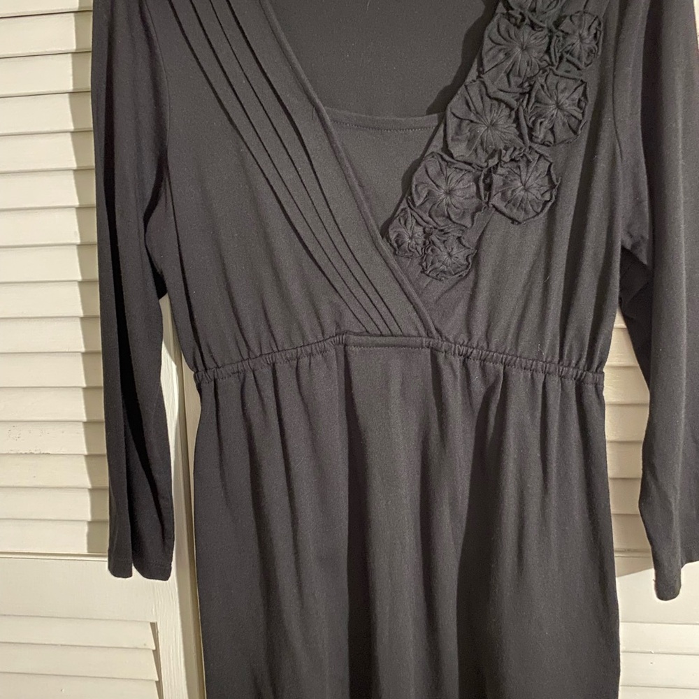 Madison Black Asymmetrical Top with Floral Detail